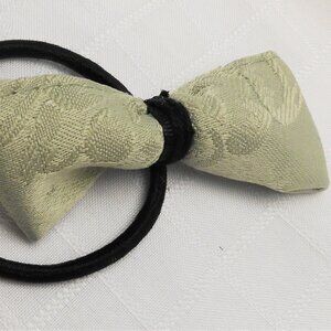 No35-36 : Two (2) bows on interchangeable rings for hairpins or elastic bands